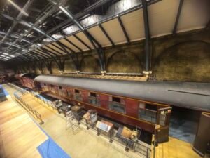 Engineers are performing a 3D scan of a train for reverse engineering