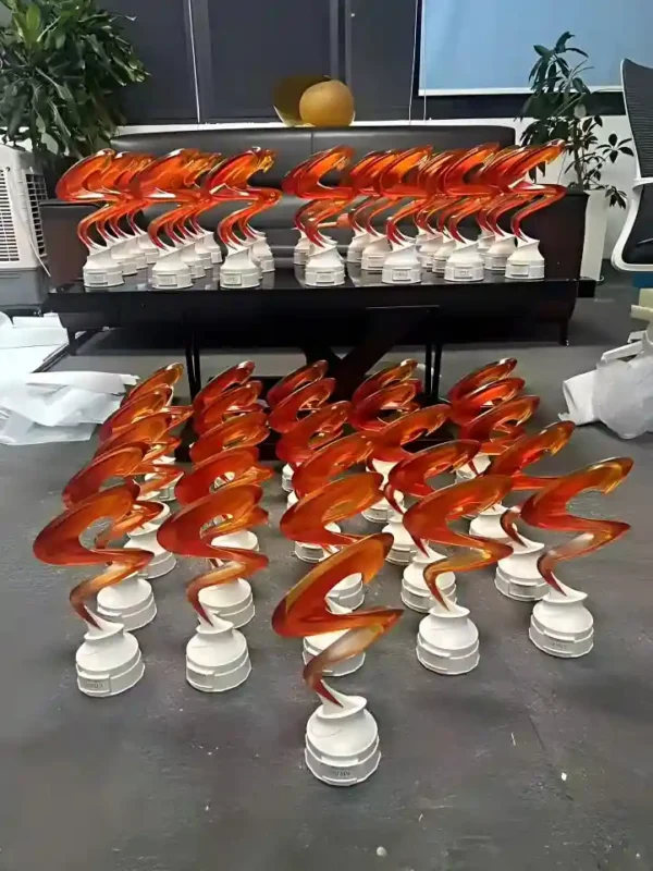 Custom 3D-printed fiberglass trophy sculptures, flame-shaped awards manufactured by professional fiberglass sculpture factory