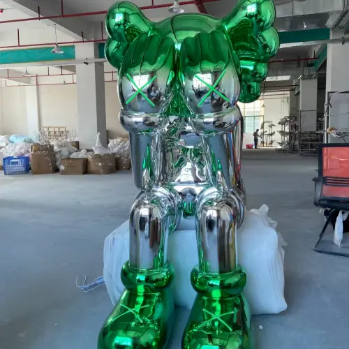 Electroplated fiberglass sculpture fabrication with mirror-like metallic surface