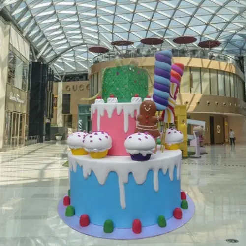 Giant cake-shaped fiberglass event sculpture for corporate product launch events